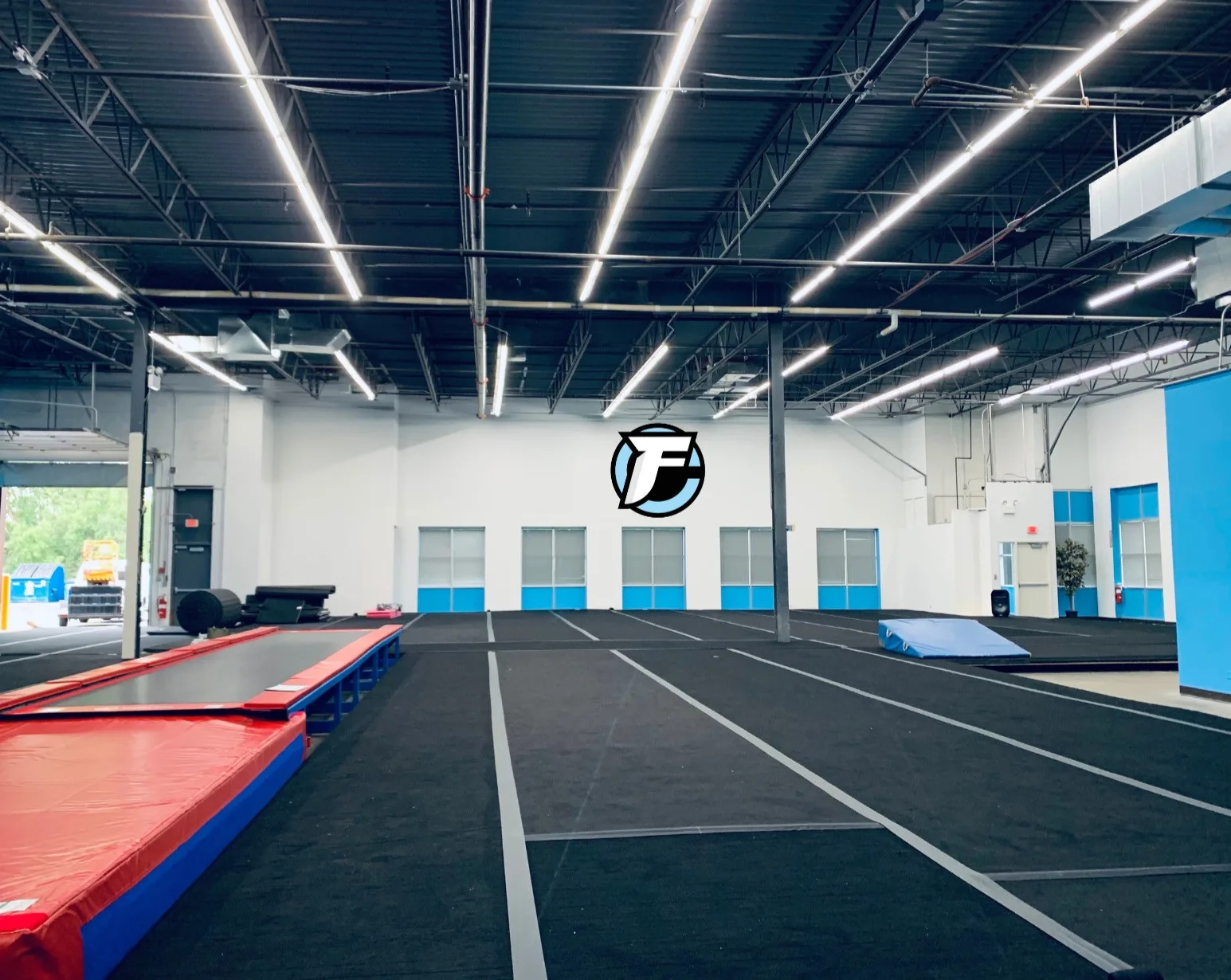 The Formula Cheer competition floor, with the Formula F logo on the far wall